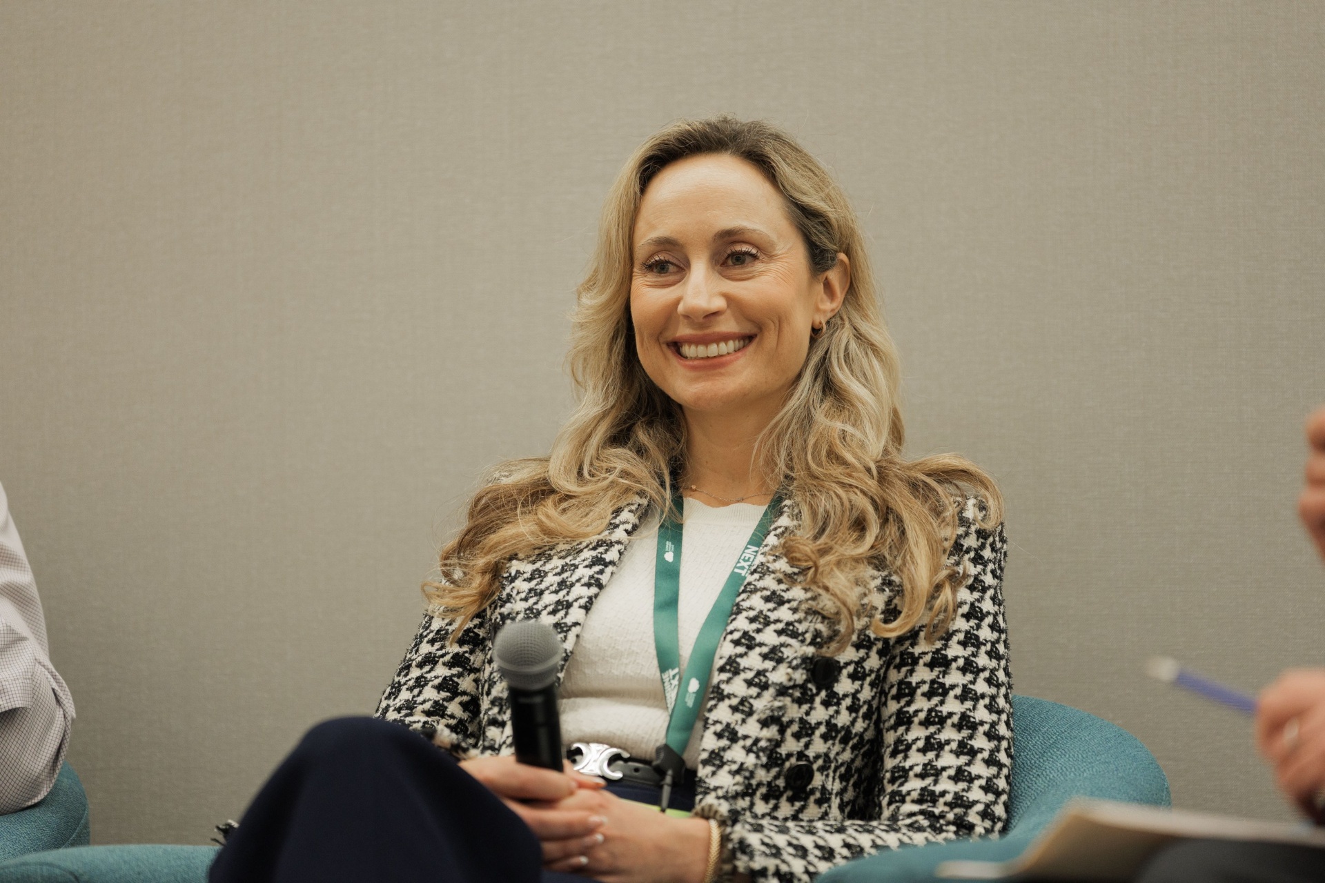 Portrait of Julia Grinshpun, Managing Director of the Green Economy Team at JP Morgan Chase, smiling on Panel 4 'Beyond Priced Rounds' at Capital Day