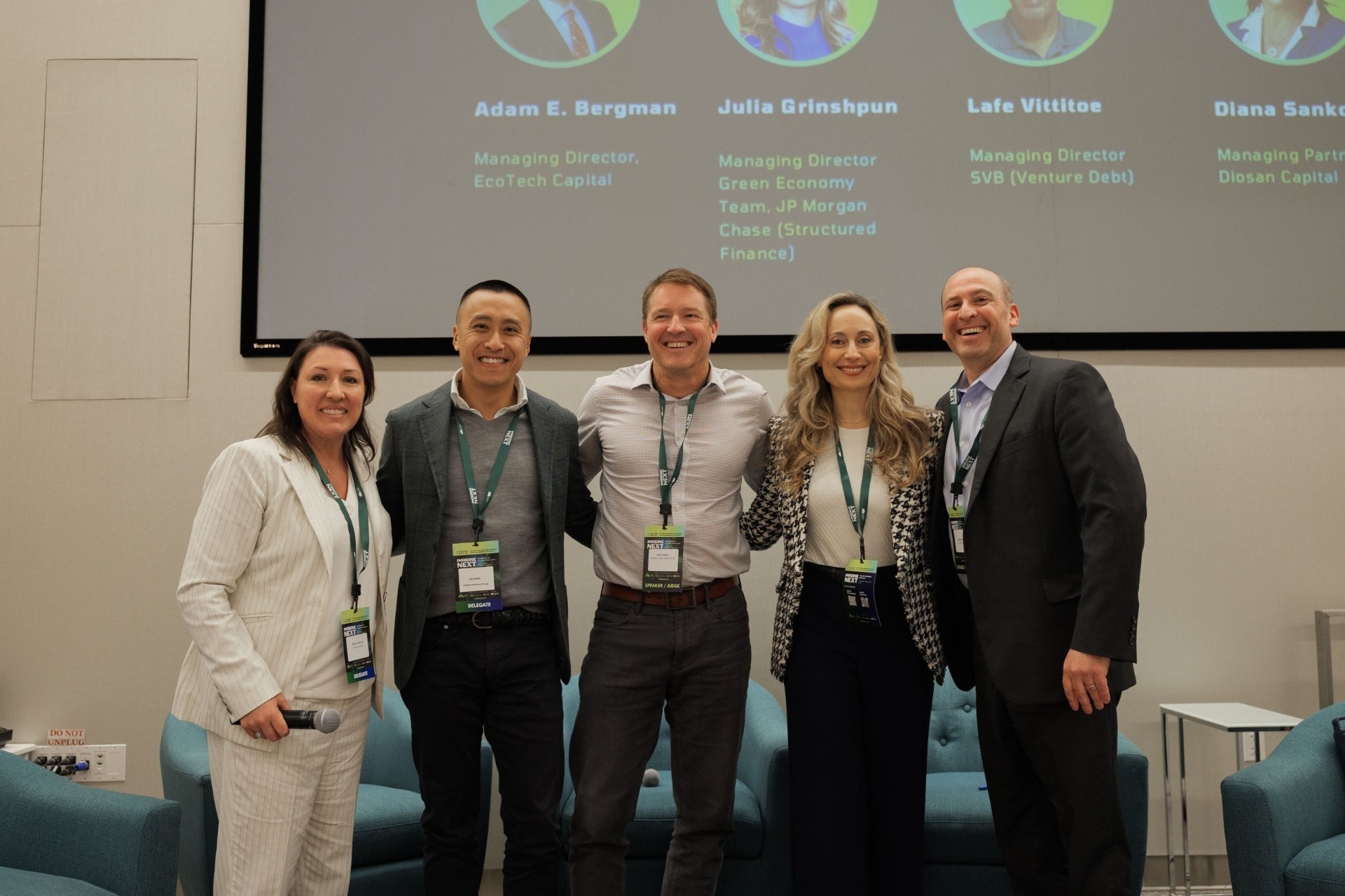 Capital Day Panel 4 group photo — Diana Sankovic, Lin Chen, Lafe Vittitoe, Julia Grinshpun and Adam E. Bergman laughing together beneath the speaker line-up slide