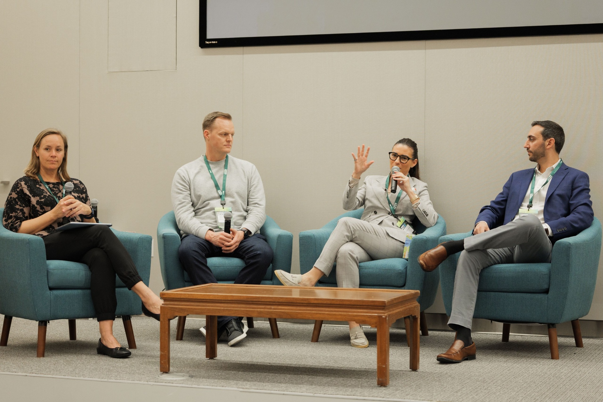 Capital Day Panel 5 'From Growth to Bankability' wide shot at UC Law SF — Christina Cairns moderating with Bryce Gilleland, Dr. Tobi Ann Petrocelli speaking and Daniel Baruch on stage