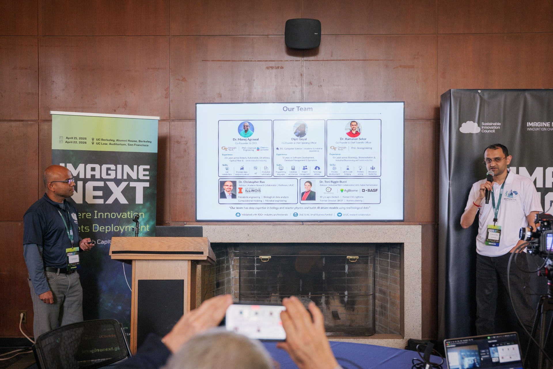BioTwinOme team slide on screen with co-founders presenting